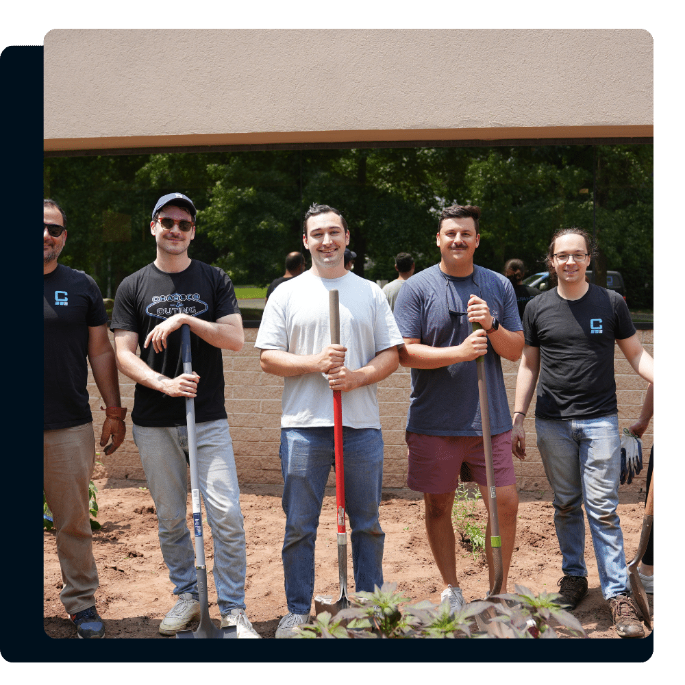 Charles IT team members volunteering with a nonprofit organization